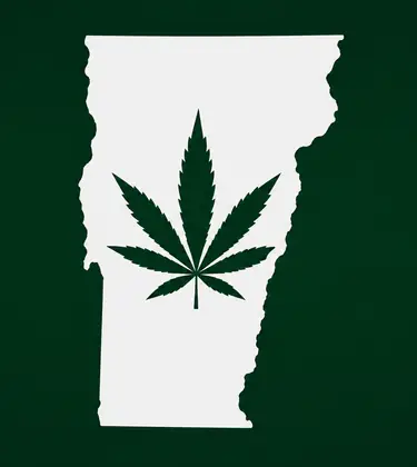 Cannabis leaf centered inside a white silhouette of Vermont on a dark green background.