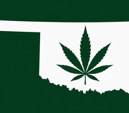 White silhouette of Oklahoma on a dark green background, with a dark green cannabis leaf centered inside the state outline.